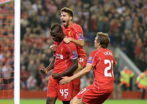 Liverpool's Mario Balotelli celebrates scoring his only goal so far in a Reds shirt ahead of today's visit from Hull City. Picture: Peter Byrne/PA.