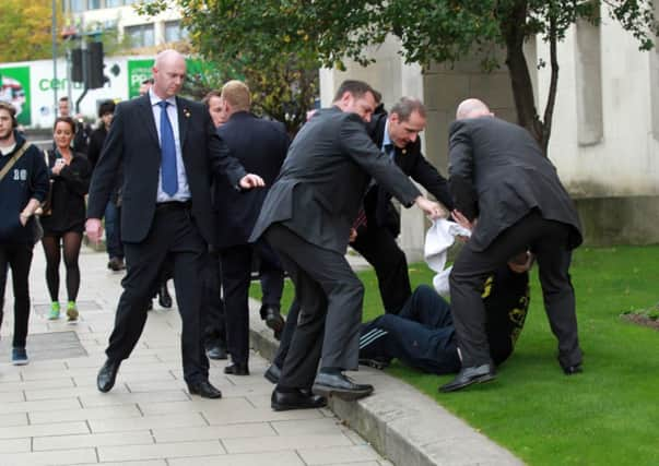 A man being arrested after Prime Minister David Cameron left Leeds Civic Hall after a conference on the planned HS2 rail links. Picture: Ross Parry Agency