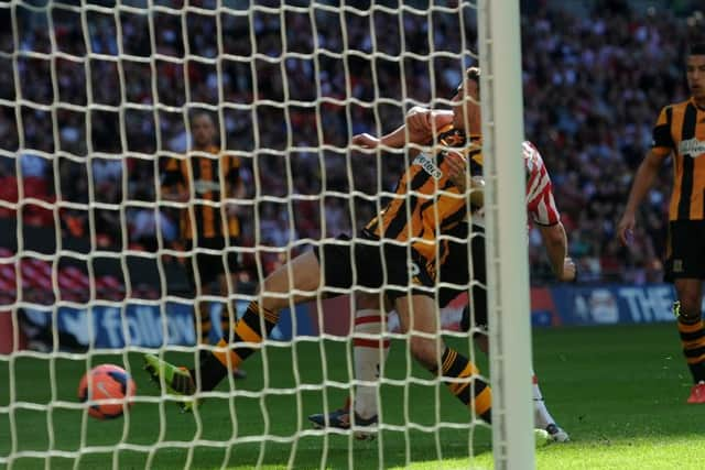 Jose Baxter, partially obscured, scores for Sheffield United against Hull City in the FA Cup semi-final, the first Blade to score at the new Wembley (Picture: Martyn Harrison).