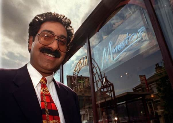 Dr Gul-Nawaz K. Akbar outside the Mumtaz restauratnt in Great Horton Road, Bradford.