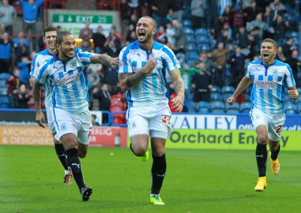 Joe Lynch celebrates scoring the opening goal