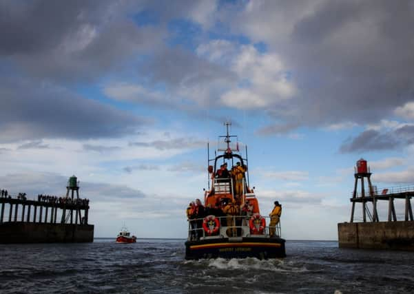 Whitby's All Weather lifeboat leads a flotilla of boats commemorating the centenary of the Rohilla disaster. Picture: Ross Parry