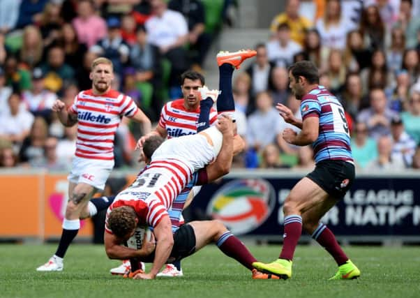 NOT GUILTY: Australias Greg Bird was cited for this tackle on Sean OLoughlin in Melbourne but avoided suspension. Picture: Photosport/SWPix