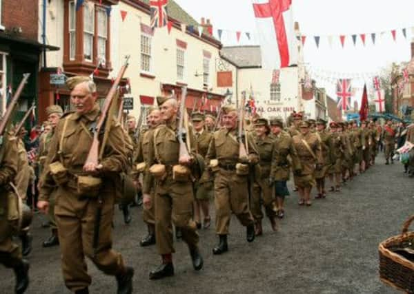 Hundreds turn out to catch a glimpse of the stars from the new Dad's Army movie as a set-piece scene is filmed in Bridlington. Picture: Ross Parry Agency