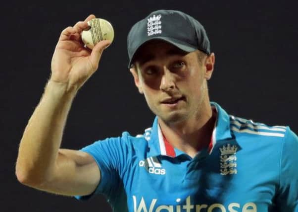 England's bowler Chris Woakes.