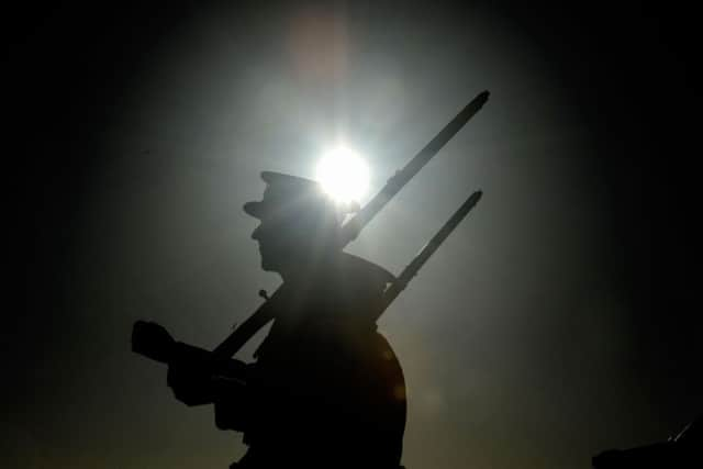 The Commemoration Society 18th Battalion Durham Light Infantry at the plaque in Hartlepool