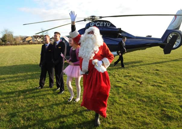 Santa visits Martin House Hospice in Boston Spa.