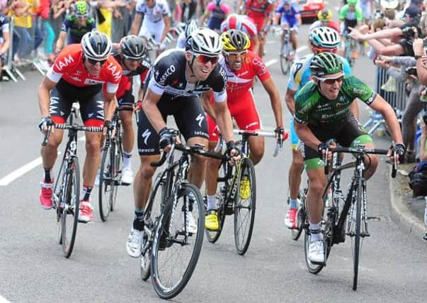 The peleton on stage two of the Tour de France, climb the steepest part of Jenkin Road in Sheffield. (Picture: Tony Johnson)