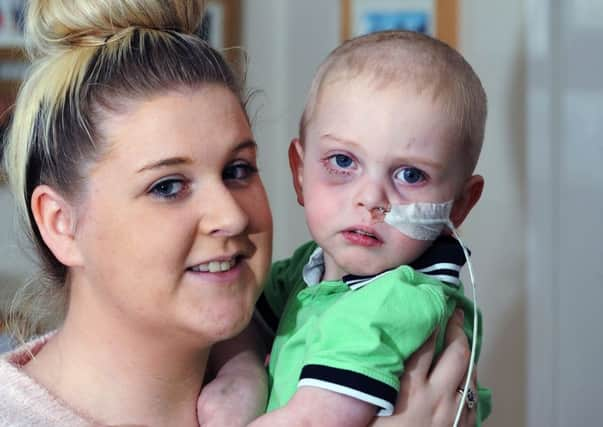 Riley Hoult with his mum Sophie. Picture by Jonathan Gawthorpe