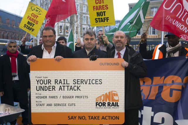 Train fare rises saw campaigners from the RMT protest outside of Kings Cross station in London.