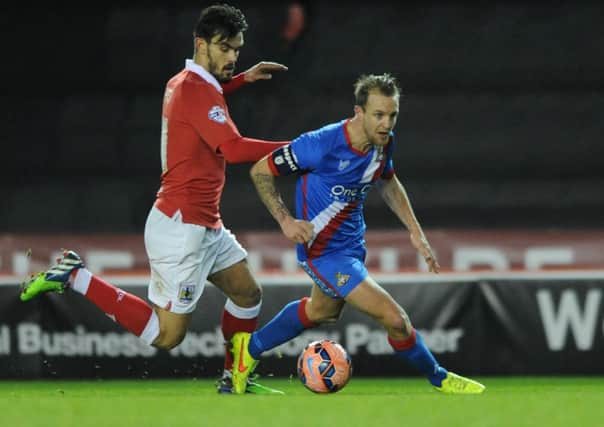 Bristol City's Marlon Pack closes down Doncaster Rovers' James Coppinger