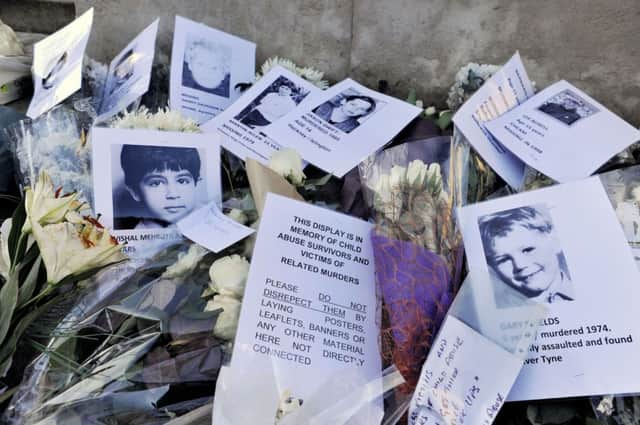 Tributes at Old Palace Yard in Westminster, during an event in commemoration of victims and survivors of child abuse, addressed by Rotherham MP Sarah Champion (below).