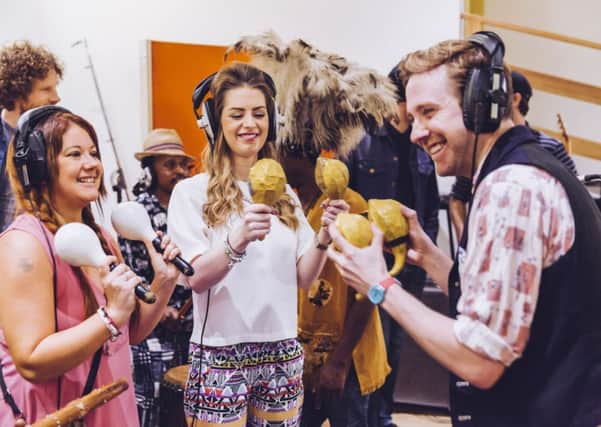 Kaiser Chiefs super fans Jessica Wright (left) and Sarah Luke (centre) with lead singer Ricky Wilson.