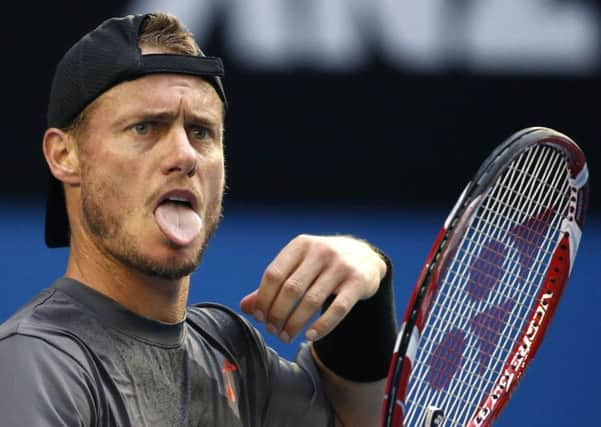 Australias Lleyton Hewitt sticks out his tongue to pass comment on a poor shot during his Australian Open match with Germanys Benjamin  Becke (Picture: Vincent Thian/AP).