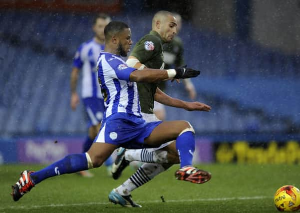 Claude Dielna is unable to get the better of Boltons Darren Pratley during Sheffield Wednesdays 2-1 defeat to Wanderers earlier this month at Hillsborough (Picture: Steve Ellis).