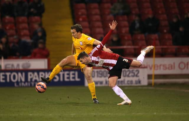 STRUGGLE: Sheffield United's Bob Harris battles for possession last night. 
Picture: Martyn Harrison.