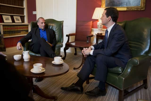 Chancellor George Osborne (right) with Greece's new anti-austerity finance minister Yanis Varoufakis during a meeting at 11 Downing Street in London.  Matt Dunham/PA Wire