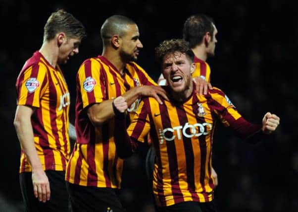 Bradford Citys Billy Clarke celebrates his equalising goal against MK Dons after returning from injury (Picture: Simon Hulme).