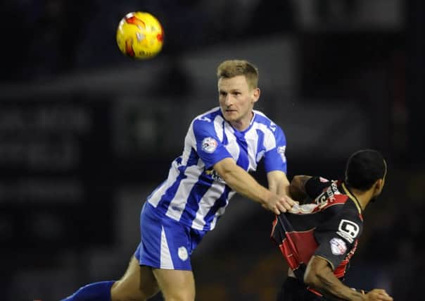 Recent results have taken the gloss off being made Shefield Wednesday captain for Tom Lees, seen in action against Bournemouths Callum Wilson (Picture: Steve Ellis).