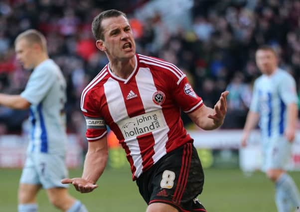 Sheffield United captain Michael Doyle celebrates making it 2-1 against former club Coventry City (Picture: Martyn Harrison).