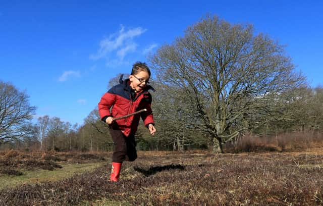 Euan Stanton, 5, enjoys the cold but sunny afternoon weather