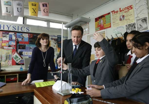 Prime Minister David Cameron was among the half a million parents waiting to see how their child had fared. Photo: Yui Mok/PA Wire