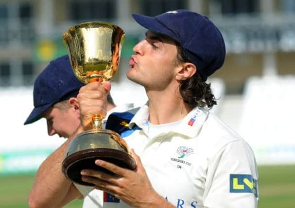 Yorkshire's Jack Brooks celebrates after winning the championship.