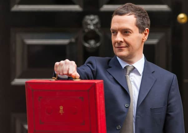 Chancellor of the Exchequer George Osborne outside 11 Downing Street, London, before heading to the House of Commons to deliver his annual Budget statement. PRESS ASSOCIATION Photo. Picture date: Wednesday March 18, 2015. See PA story BUDGET Main. Photo credit should read: Dominic Lipinski/PA Wire