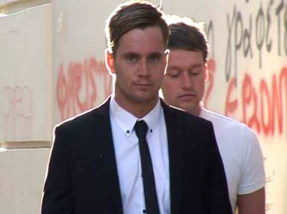 Luke Walker (left) arriving at Heraklion Mixed Court in Crete