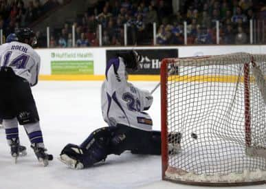 MAGIC MOMENT: Carl Lauzon's (hidden) shot flies past Braehead goaltender Kyle Jones to send Hull Stingrays through to the Elite League play-off semi-finals. Picture: Arthur Foster.