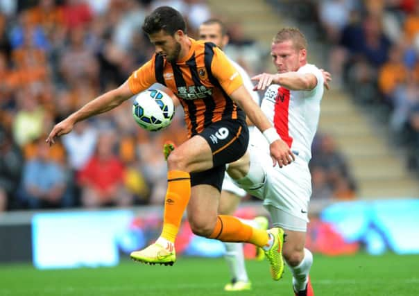 Shane Long on Hull duty at the start of the season.