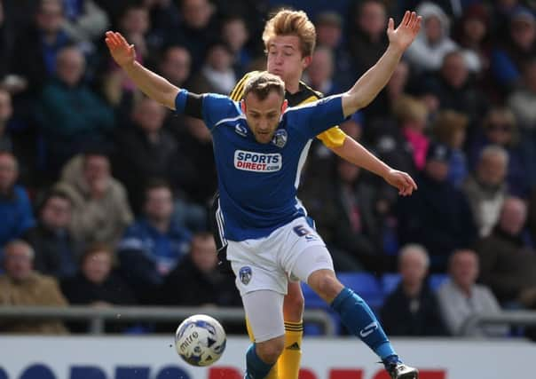 Louis Reed of Sheffield United, in action against Oldham. (Blades Sports Photography)