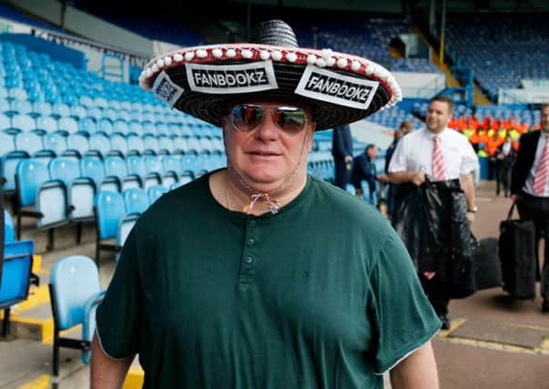 Rotherham Manager, Steve Evans arrives at at Elland Road in beach attire and a Sombrero.