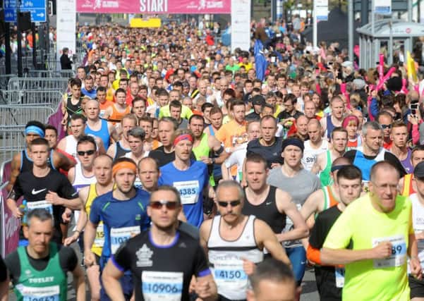 Leeds Half Marathon runners set off. Picture by Simon Hulme.