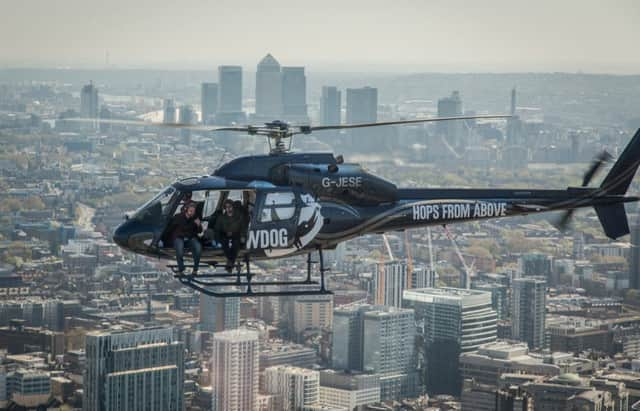 BrewDog dropped taxidermy fat cats carrying the Equity for Punks prospectus from a helicopter over the City