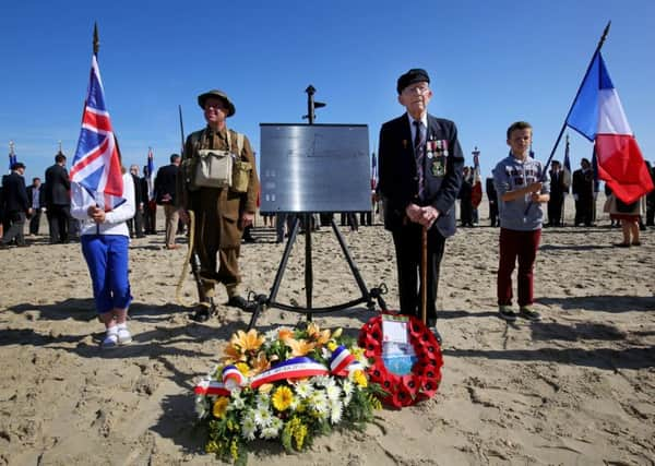 Dunkirk veteran Vic Viner, 98 (second right) attends a memorial and plaque unveiling to the 300 killed onboard the MV Crested Eagle