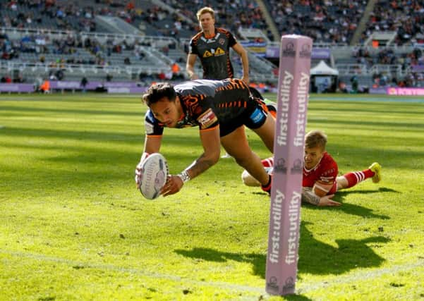 Castleford's Denny Solomona scores his opening tryagainst Wakefield Wildcats. Picture: PA.