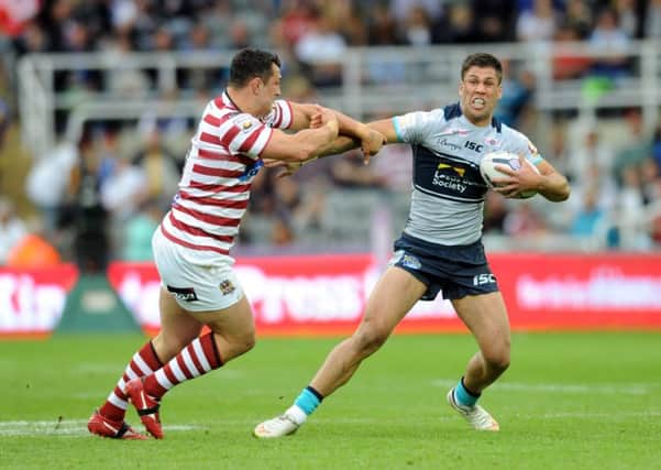 Magic Weekend Newcastle
Leeds Rhinos v Wigan Warriors
 sat 30th may 2015
Joel Moon holds off Ben Flower of Wigan