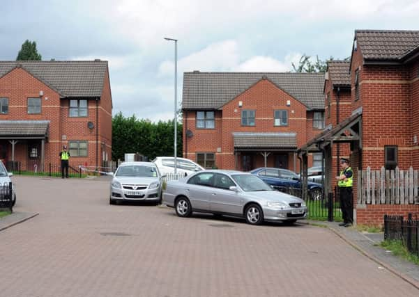 Police on Grasmere Court following Nazim Dins death on August 28, 2013.