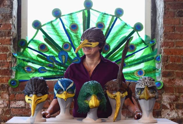 Faceless artistic director Bev Adams, pictured at The Calder with masks from Conference of the Birds.
Picture: Scott Merrylees