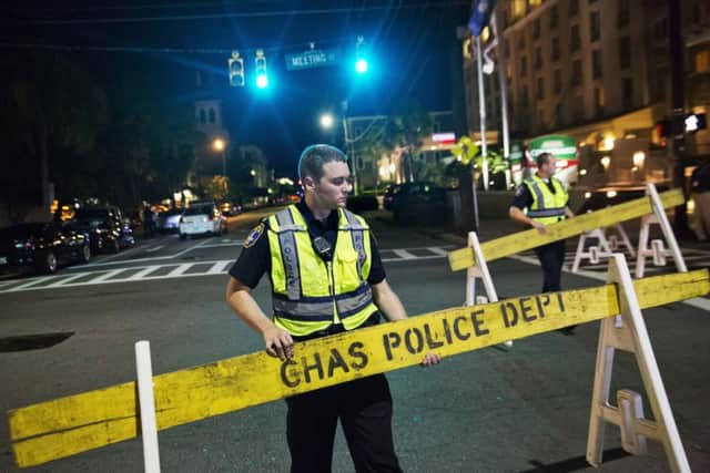 Police close off a section of Calhoun Street near the Emanuel AME Church. (AP Photo/David Goldman)