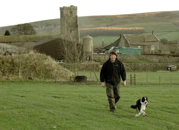 Ernest Bainbridge on his farm near Richmond.