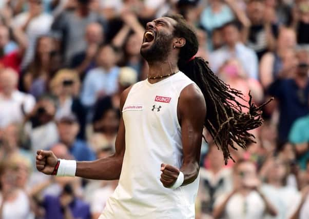 Dustin Brown celebrates victory over Rafael Nadal (Picture: Adam Davy/PA Wire).