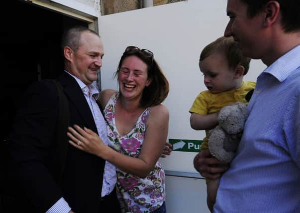 Managing Director and CEO of Sirius Minerals Chris Fraser (left) is congratulated as potash mine supporters celebrate at Sneaton Castle, Whitby, as a plan to build a huge potash mine in one of the UK's national  parks is approved. Photo: John Giles/PA Wire