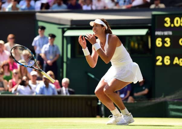 Garbine Muguruza celebrates reaching the Wimbledon final.