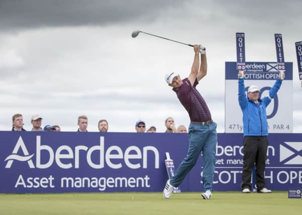 England's Justin Rose tees off at the 10th hole.