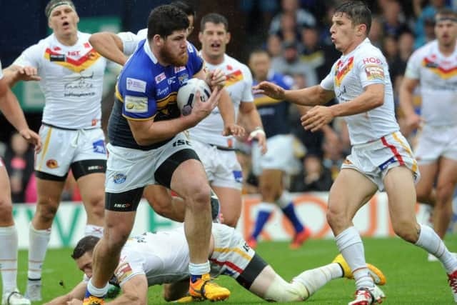 Leeds Rhinos Mitch Garbutt makes his way to the line against Catalans Dragons for the maiden senior try of his caree (Piicture: Steve Riding).