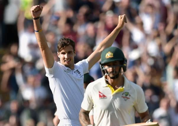 Englands Steven Finn celebrates taking the wicket of Australias Mitchell Johnson, his fifth of the innings, as Alastair Cooks men closed in on a 2-1 lead in the Ashes series (Picture: Joe Giddens/PA Wire).