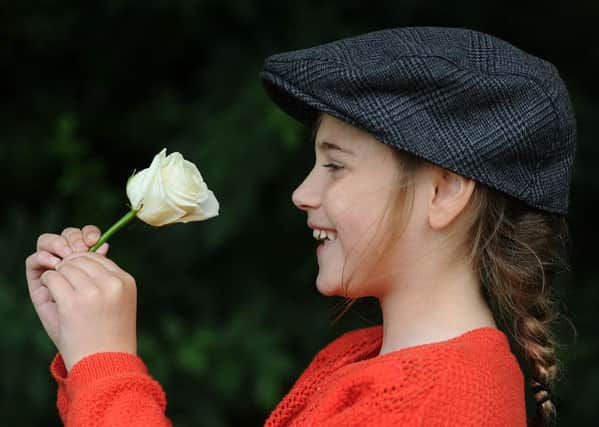 Eight-year-old Raeleigh Guest from Rotherham celebrates at a Yorkshire Day event at Wentbridge House Hotel near Pontefract. Picture: Scott Merrylees