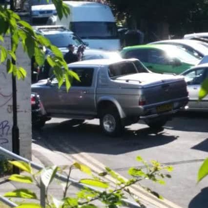 Armed officer at Duke Street